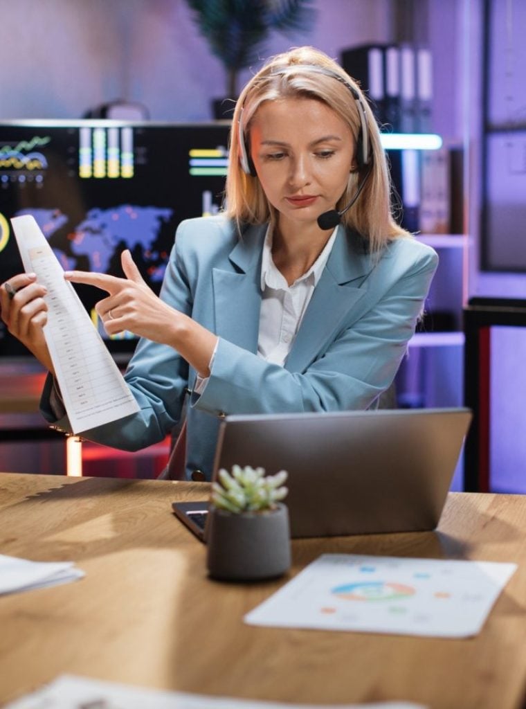business-woman-using-headset-and-laptop-for-video-call-e1658029692465.jpg