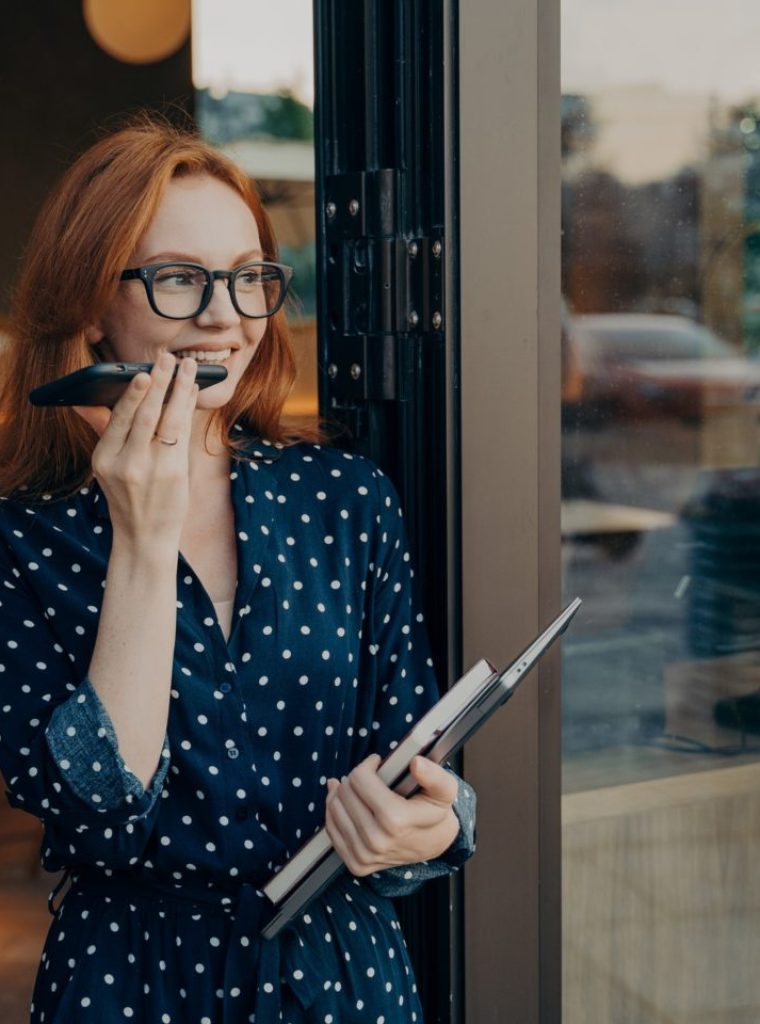 young-woman-makes-voice-call-uses-modern-technologies-for-communication-e1658029666762.jpg